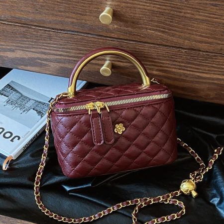 Burgundy quilted handbag